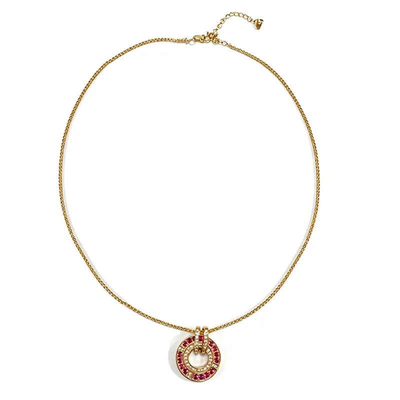 Rouge halo necklace worn with a v-neck