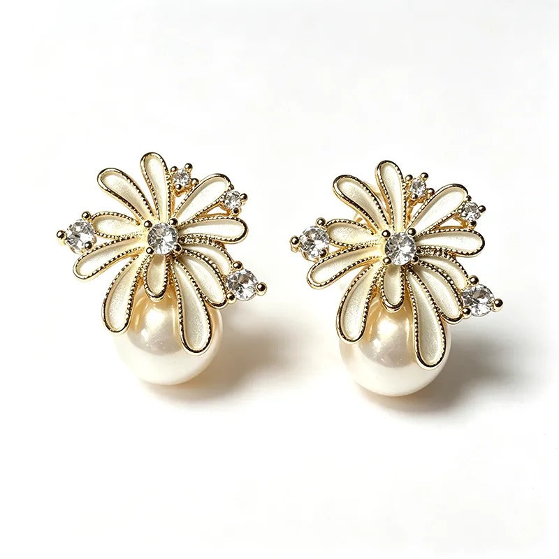 Pearl bloom studs worn
