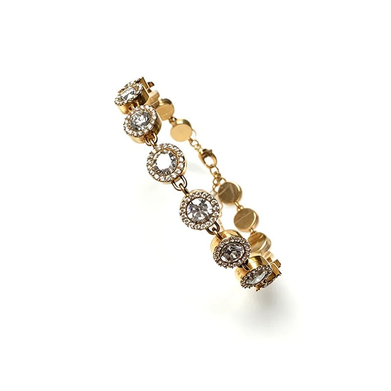 Gold tennis bracelet with safety clasp