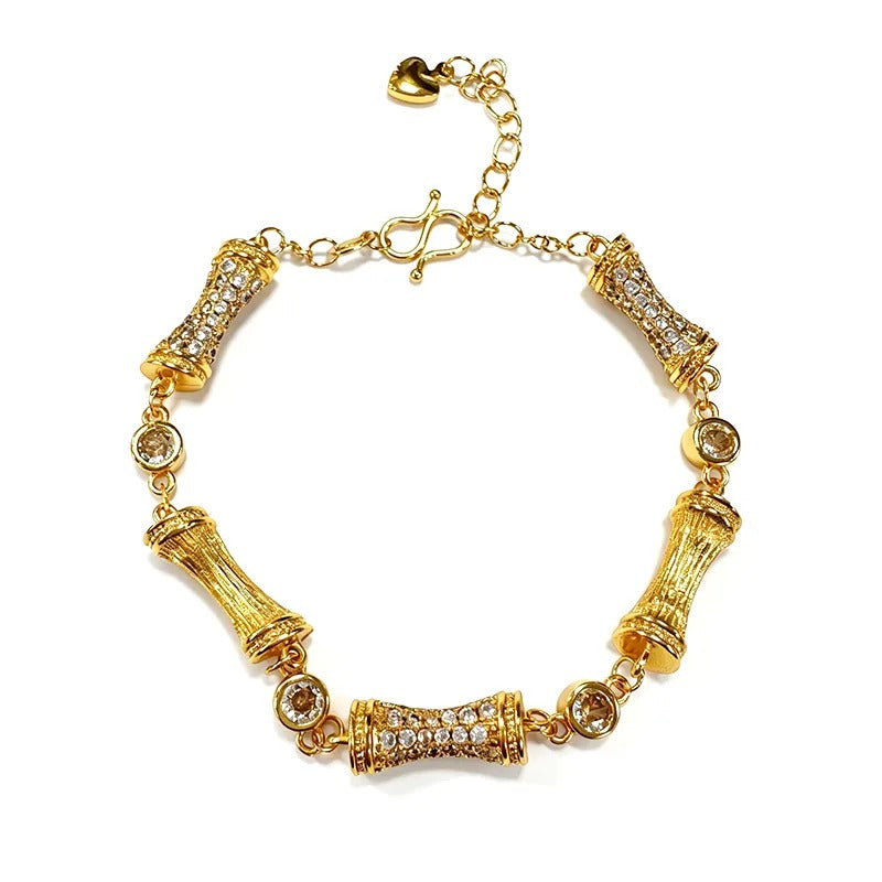 Gold sculpted link bracelet with alternating pavé links